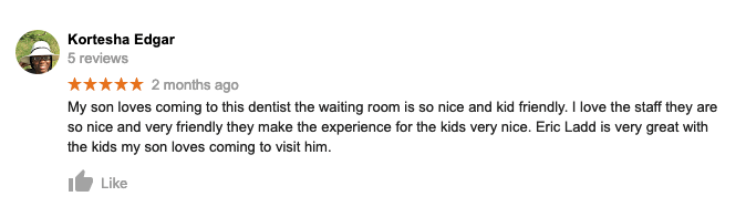 A blurred image of a facebook review for a dentist.