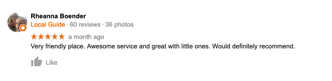 A blurry picture of a person 's review on a facebook page.