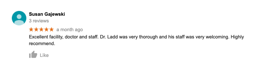A blurred image of a person 's review on a google review page.