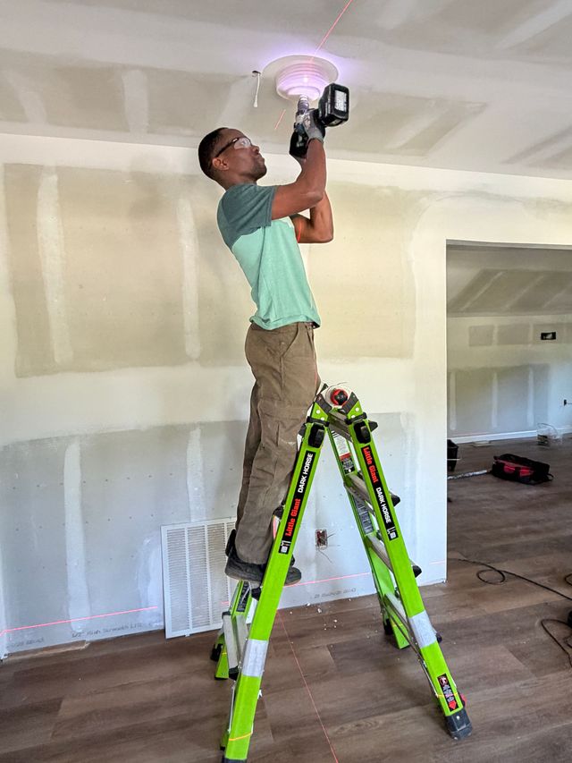 Electrician Drilling Ceiling Holes in Salisbury, NC