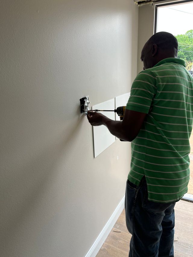 Electrician Installing Switch in Winston-Salem, NC