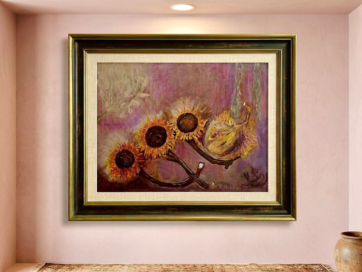 Framed abstract floral painting with sunflowers on a pink wall shelf-like recess