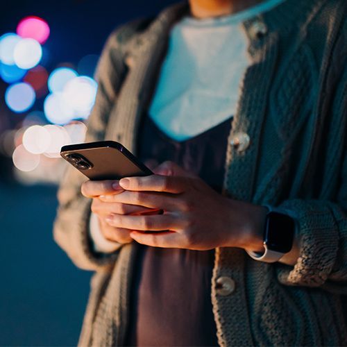 Woman Using Smartphone — Montgomery, AL — Internal Medicine Associates