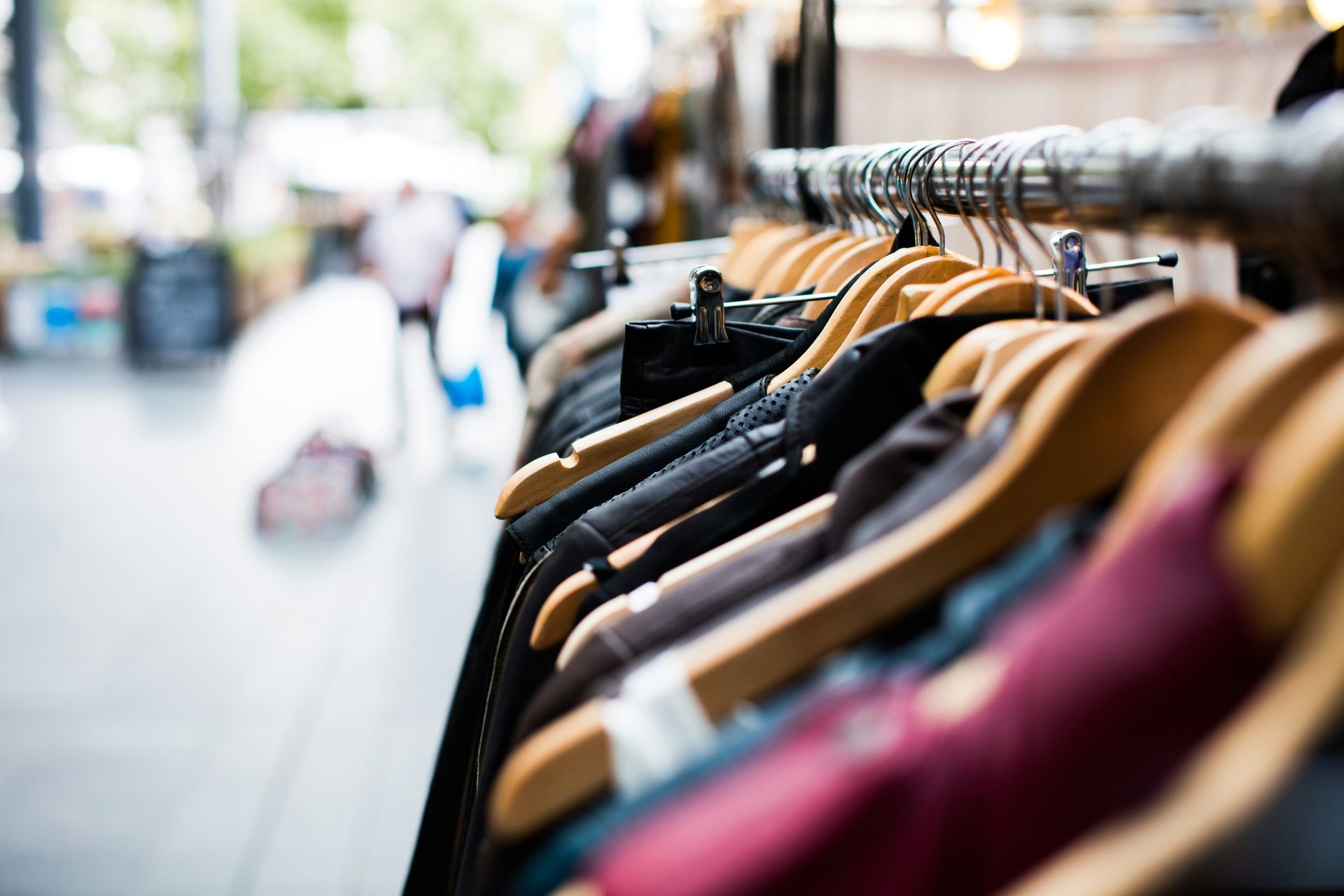 A clothing rack in a thrift store.