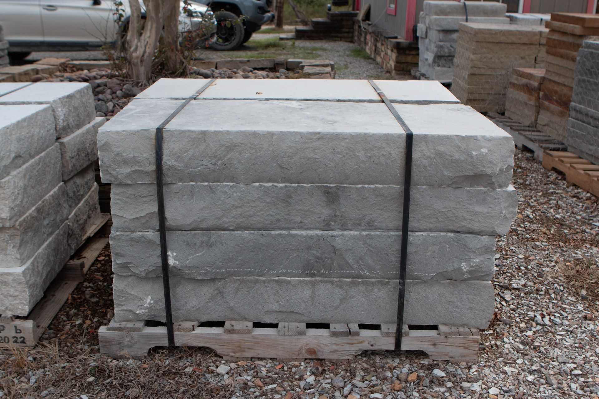 A stack of concrete blocks on a wooden pallet
