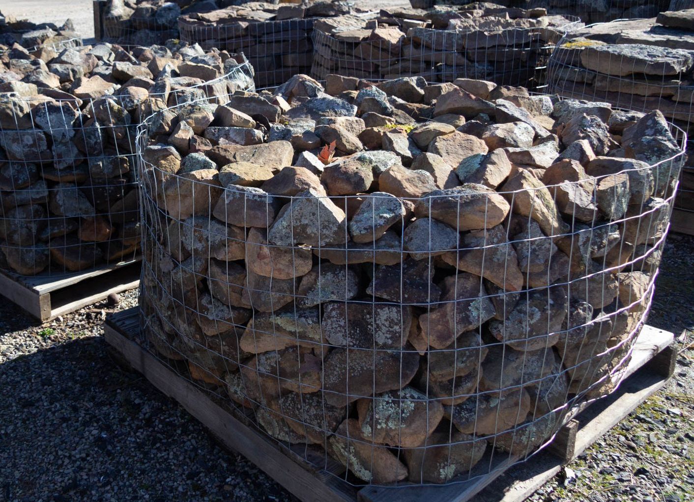 A pile of rocks sitting on top of a wooden pallet.
