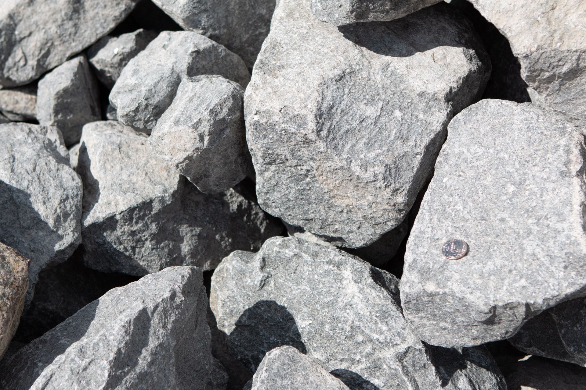 A pile of rocks with a hole in the middle of one of them