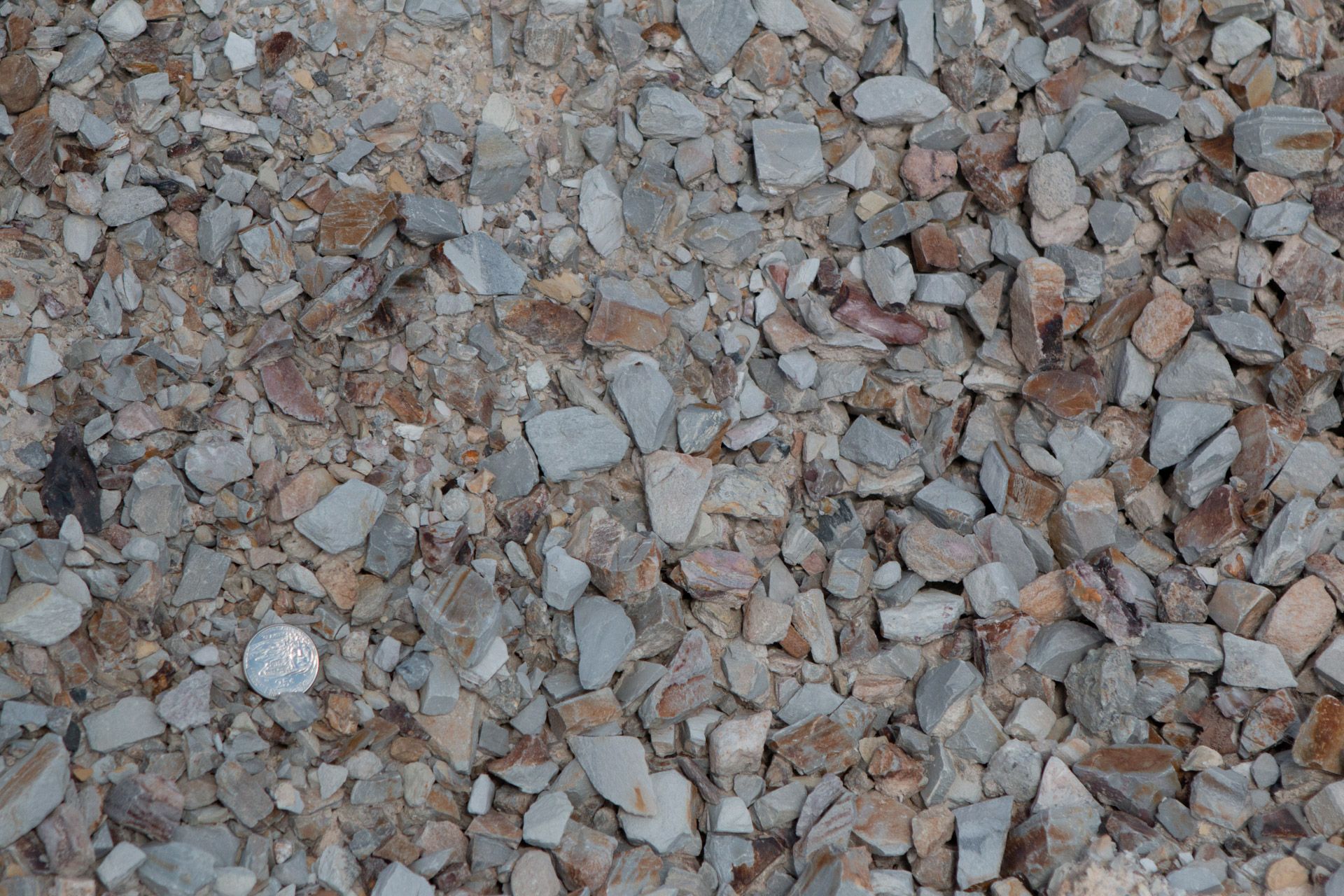 A pile of gravel with a lot of small rocks in it