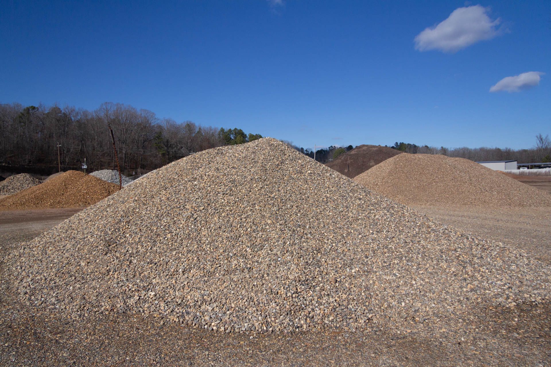 Three piles of gravel are stacked on top of each other