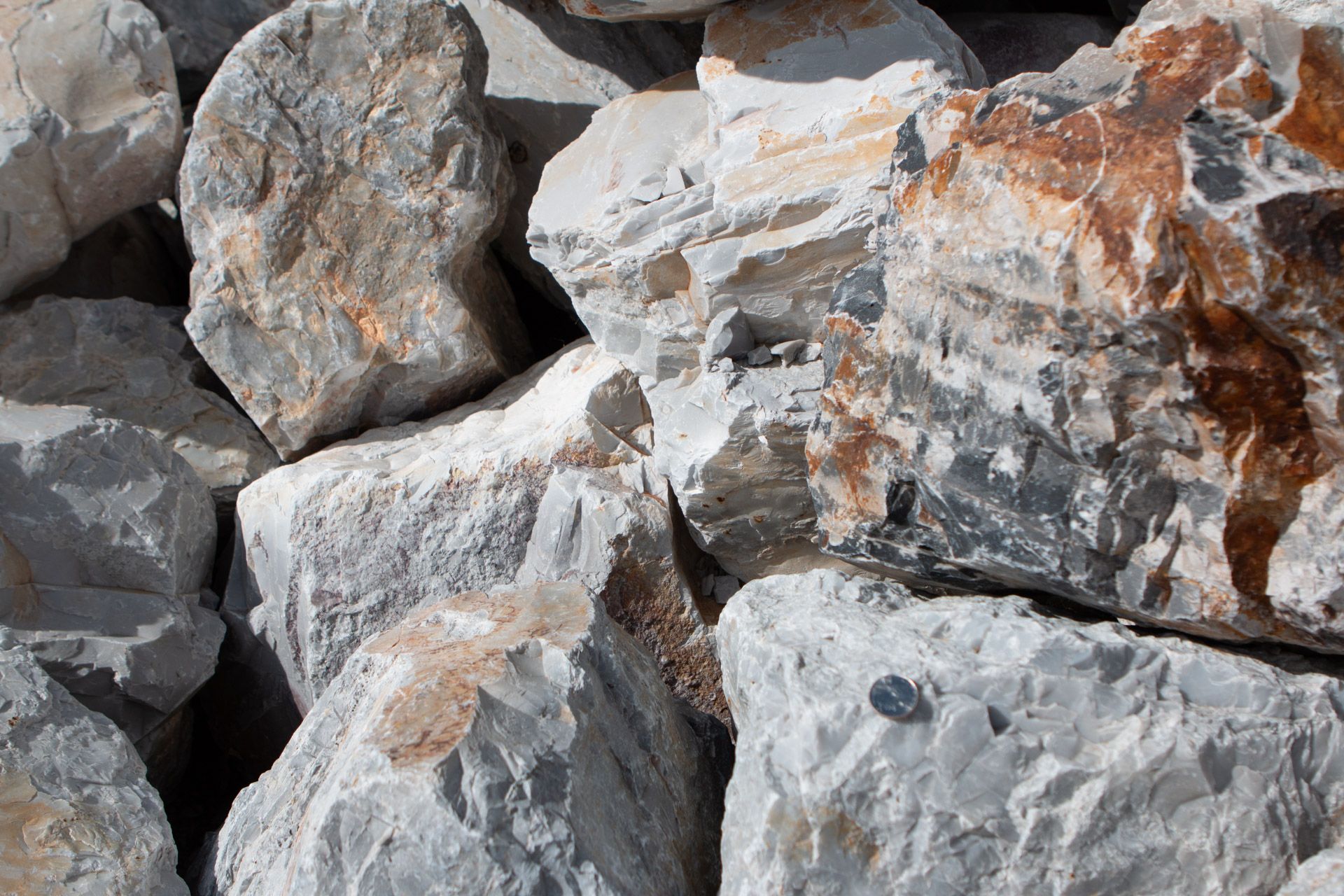 A pile of rocks sitting on top of each other on a table.