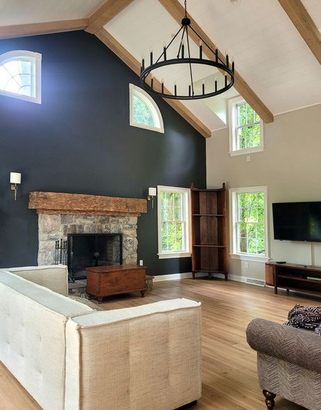 Living room A living room with a vaulted ceiling and a fireplace