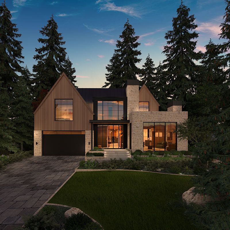 Modern two-story house with wood and stone facade, lit windows, and tall pine trees at dusk