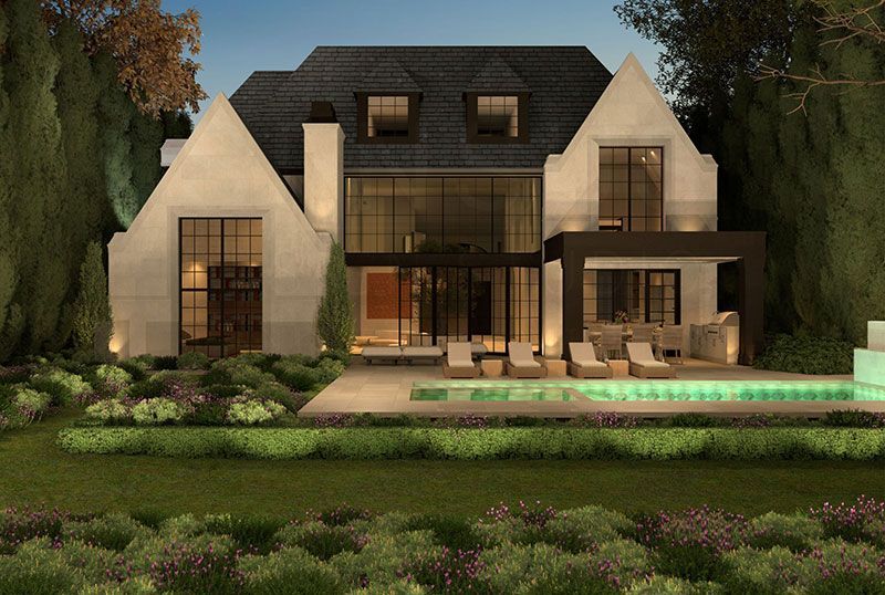 Modern two-story house with large windows, a pool, and landscaped garden at dusk