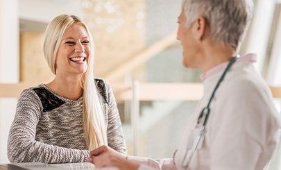 doctor and patient laughing