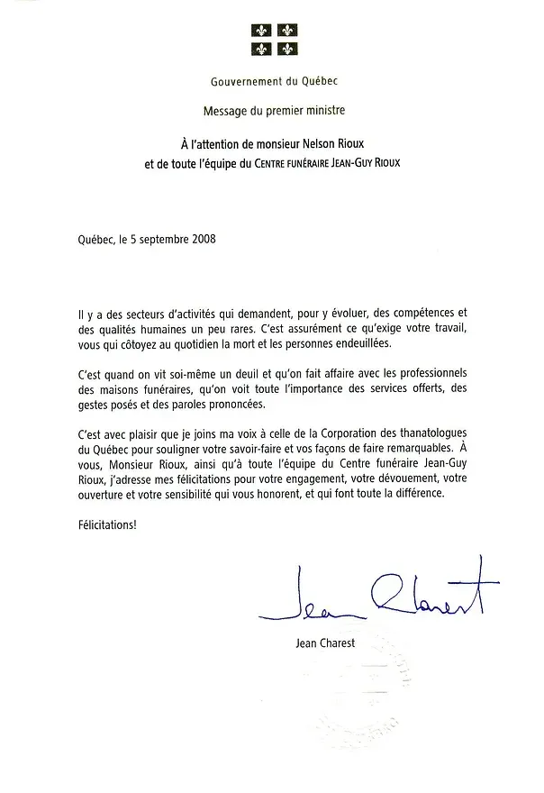 Une lettre avec une signature est sur un fond blanc.