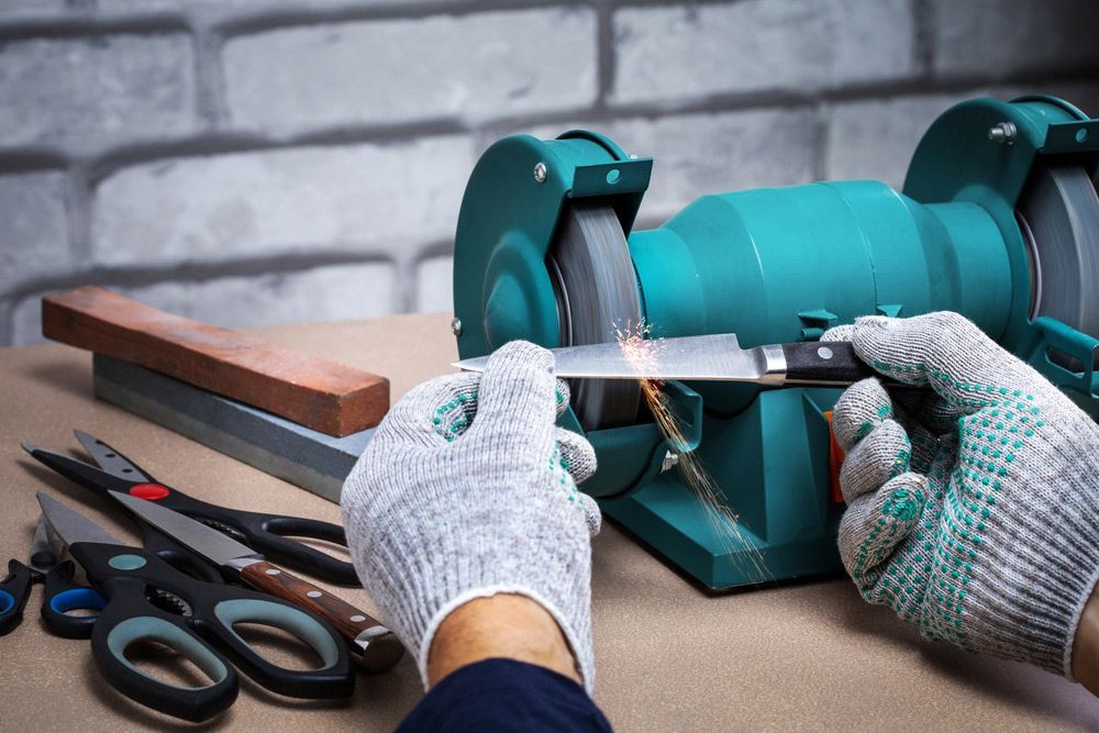 Sharpening Knife Using Electric Sharpener — Mobile Scissor Sharpening in Ilkley, QLD