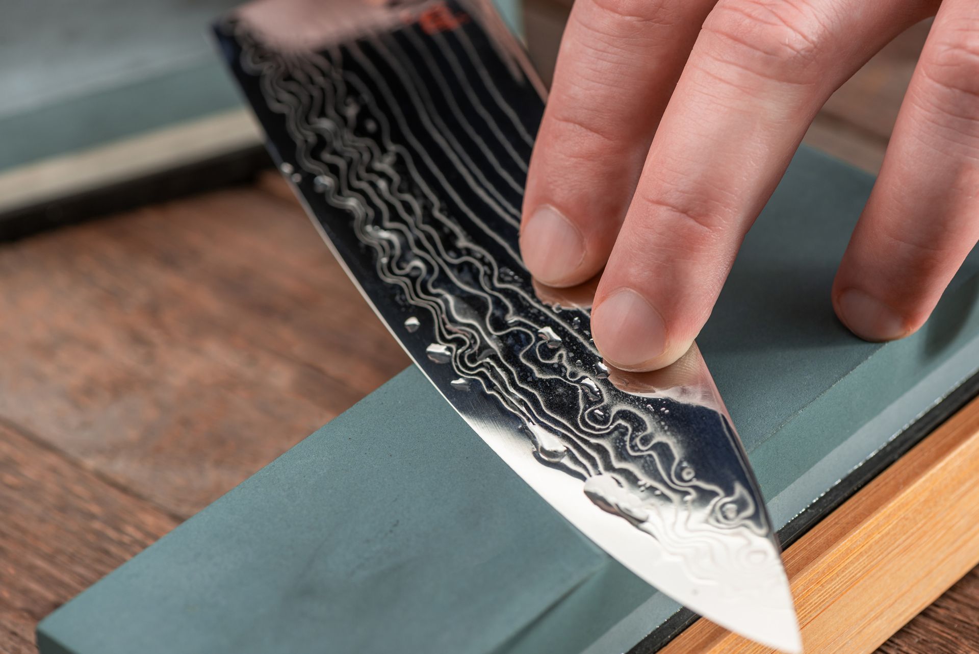 Hair Clipper And Scissors On Wood — Mobile Scissor Sharpening in Ilkley, QLD
