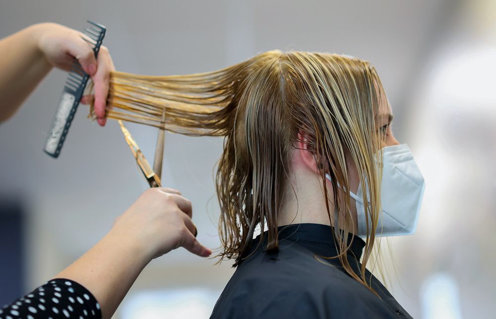 Woman Cutting Hair Short — Mobile Scissor Sharpening in Sunshine Coast, QLD