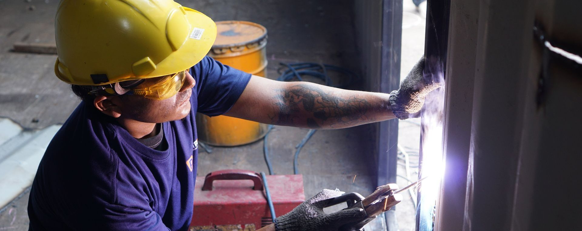 Picture of technician welding in the trade