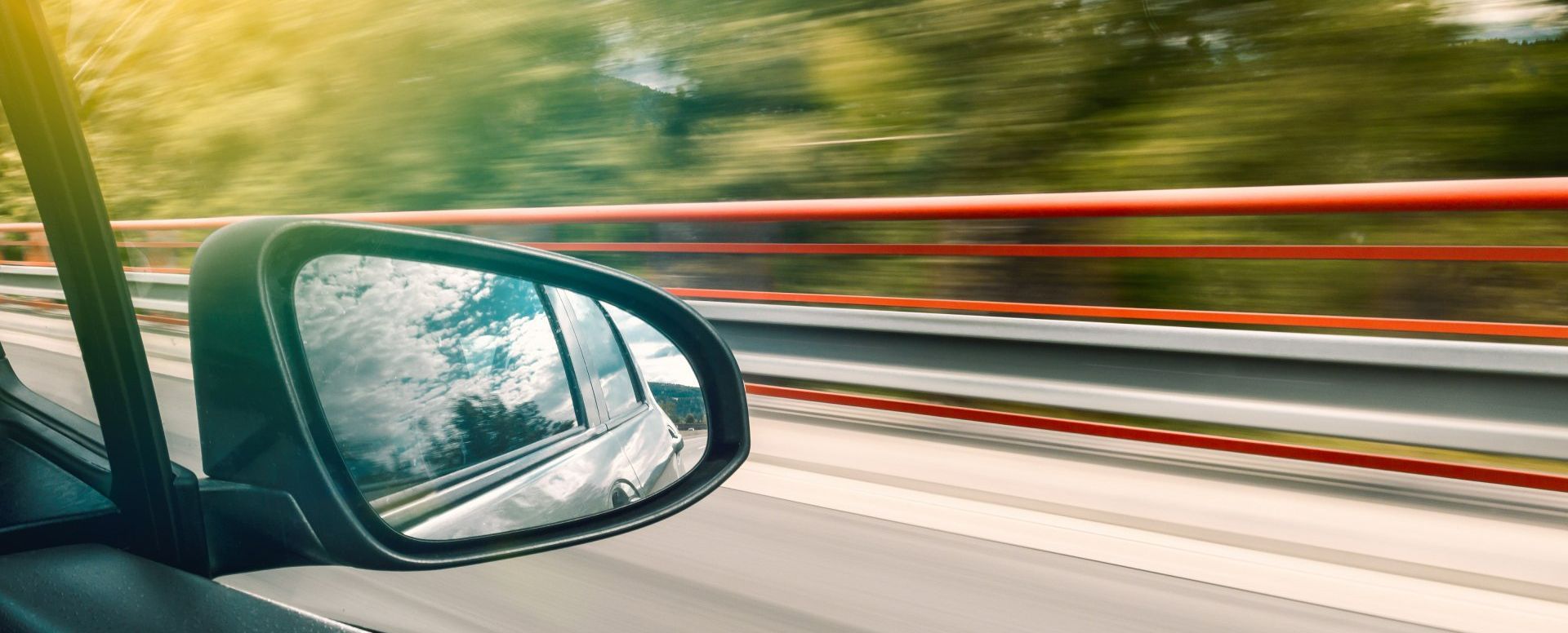 image taken from passenger seat of a car while moving