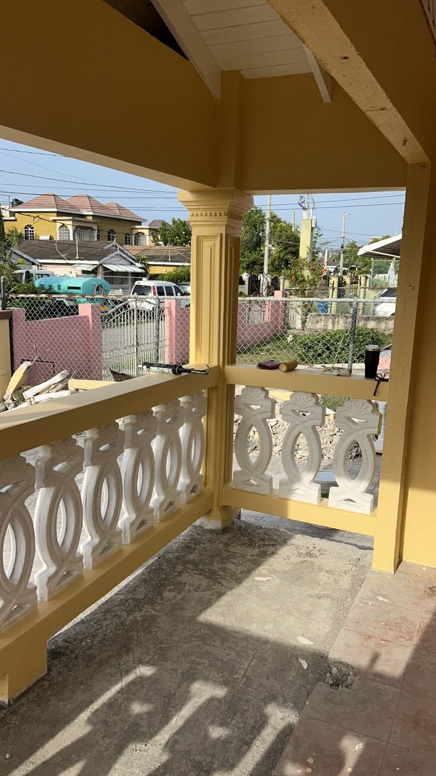 Covered porch with decorative railing