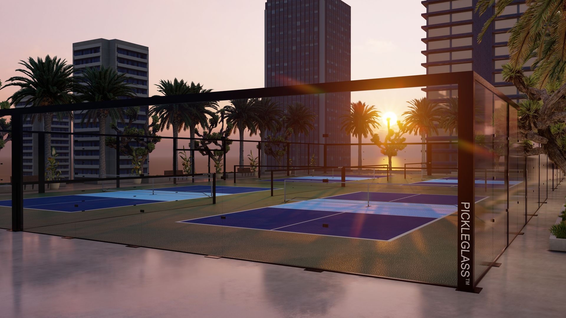 A tennis court with a playground in the background