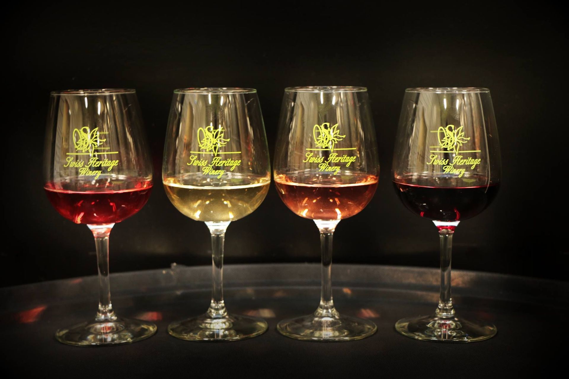 Swiss Heritage Winery Wines by the glass, bottle and wine flights.