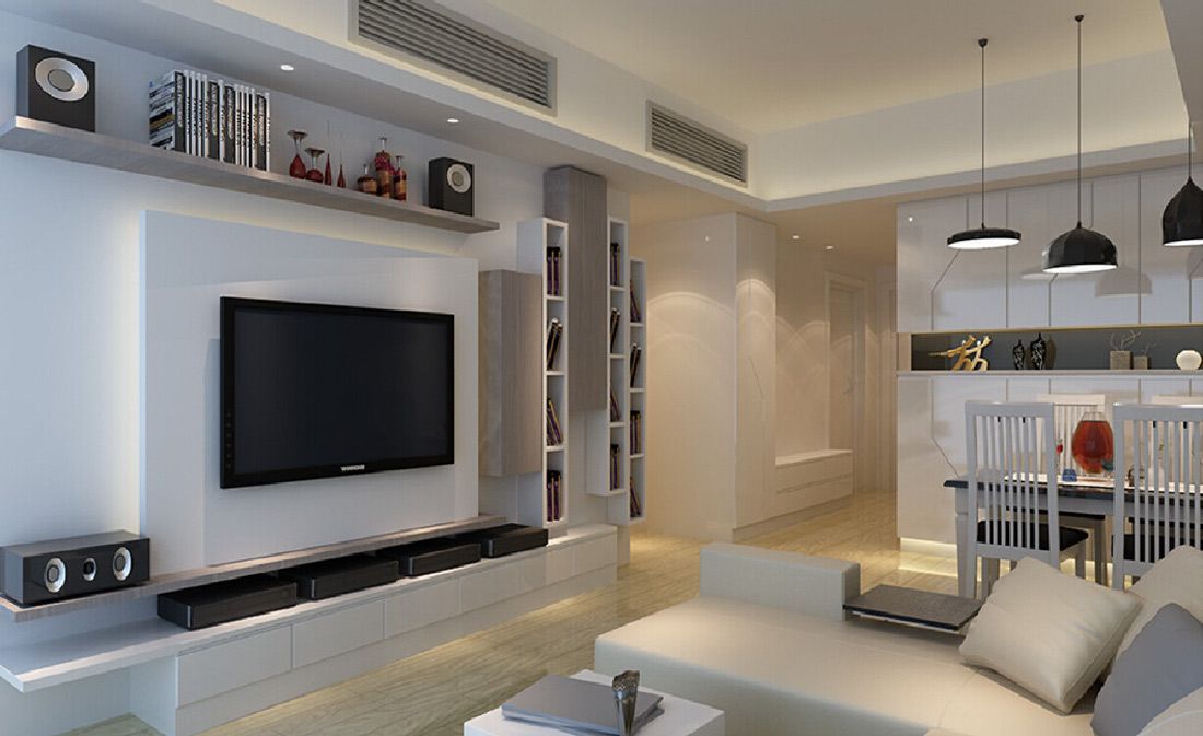 A Living Room With a Couch and a Flat Screen TV on the Wall — Nauticool Refrigeration & Air Conditioning in Cannonvale, QLD
