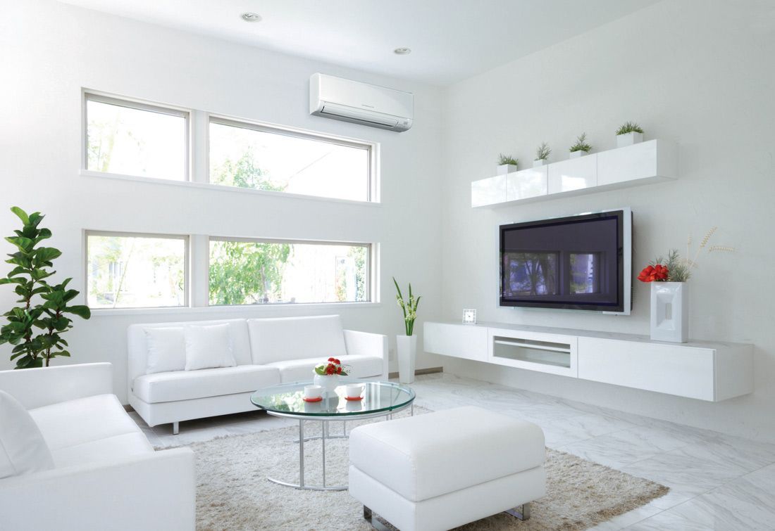 A Living Room With Air Condition and a Flat Screen TV — Nauticool Refrigeration & Air Conditioning in Cannonvale, QLD