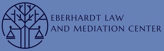 A logo for the eberhardt law and mediation center