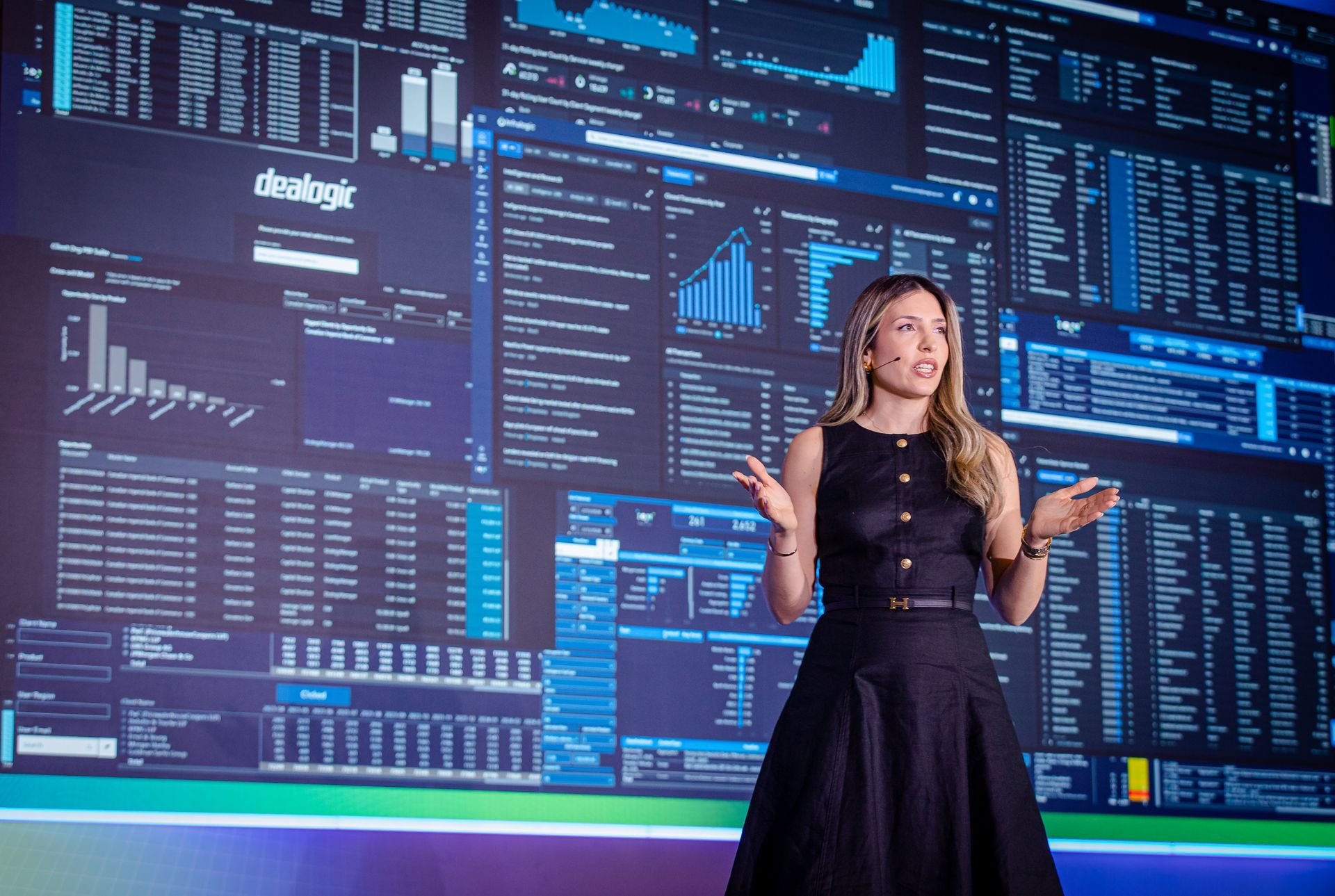 A photo taken by Ash Garwood of a woman presenting at a corporate gala.