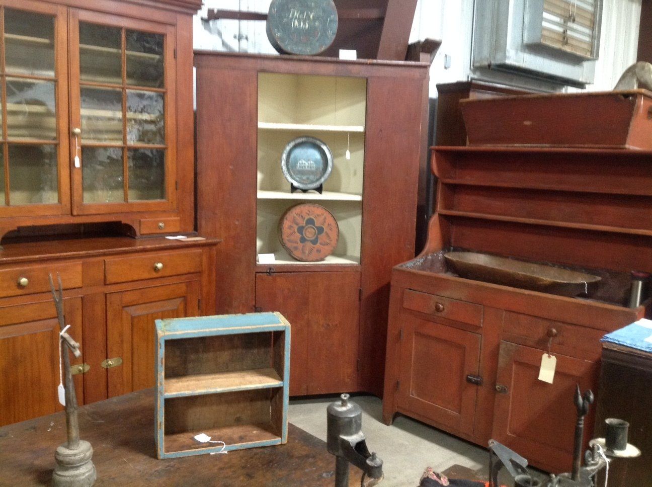 A room filled with lots of wooden cabinets and shelves