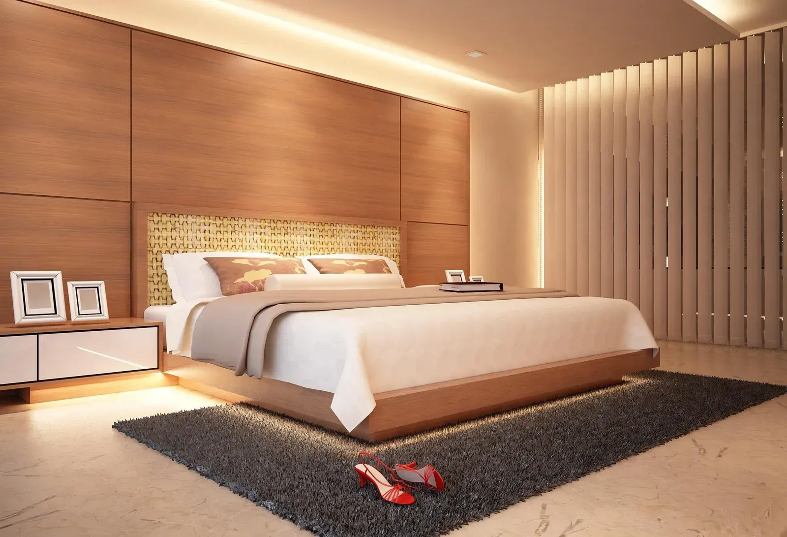 A bedroom with a king size bed and a rug