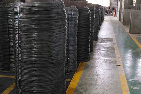 A warehouse filled with lots of rolls of wire.
