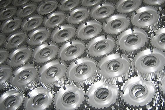 A bunch of metal gears are stacked on top of each other