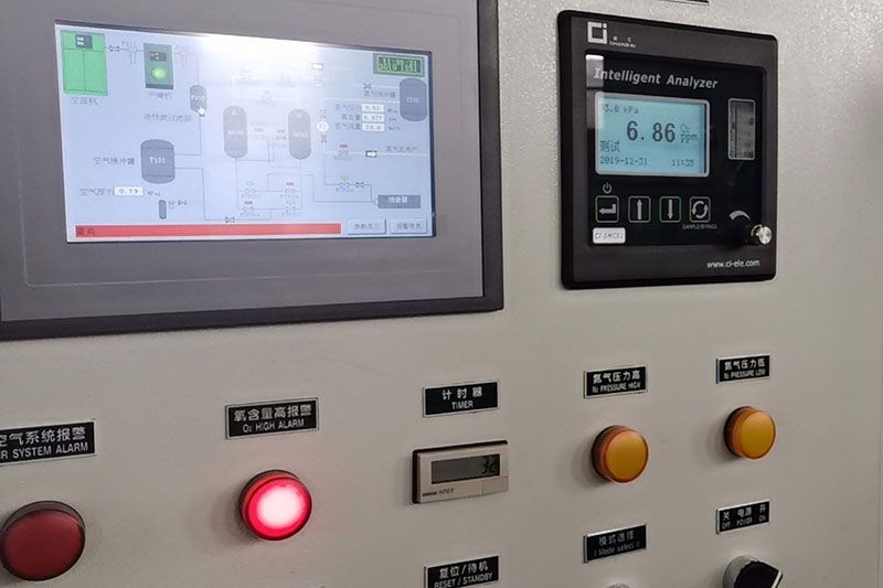 A control panel with a monitor and buttons on it.