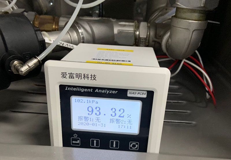 A white device that says intelligent analyzer on it