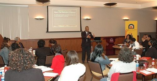 A man is giving a presentation to a group of people