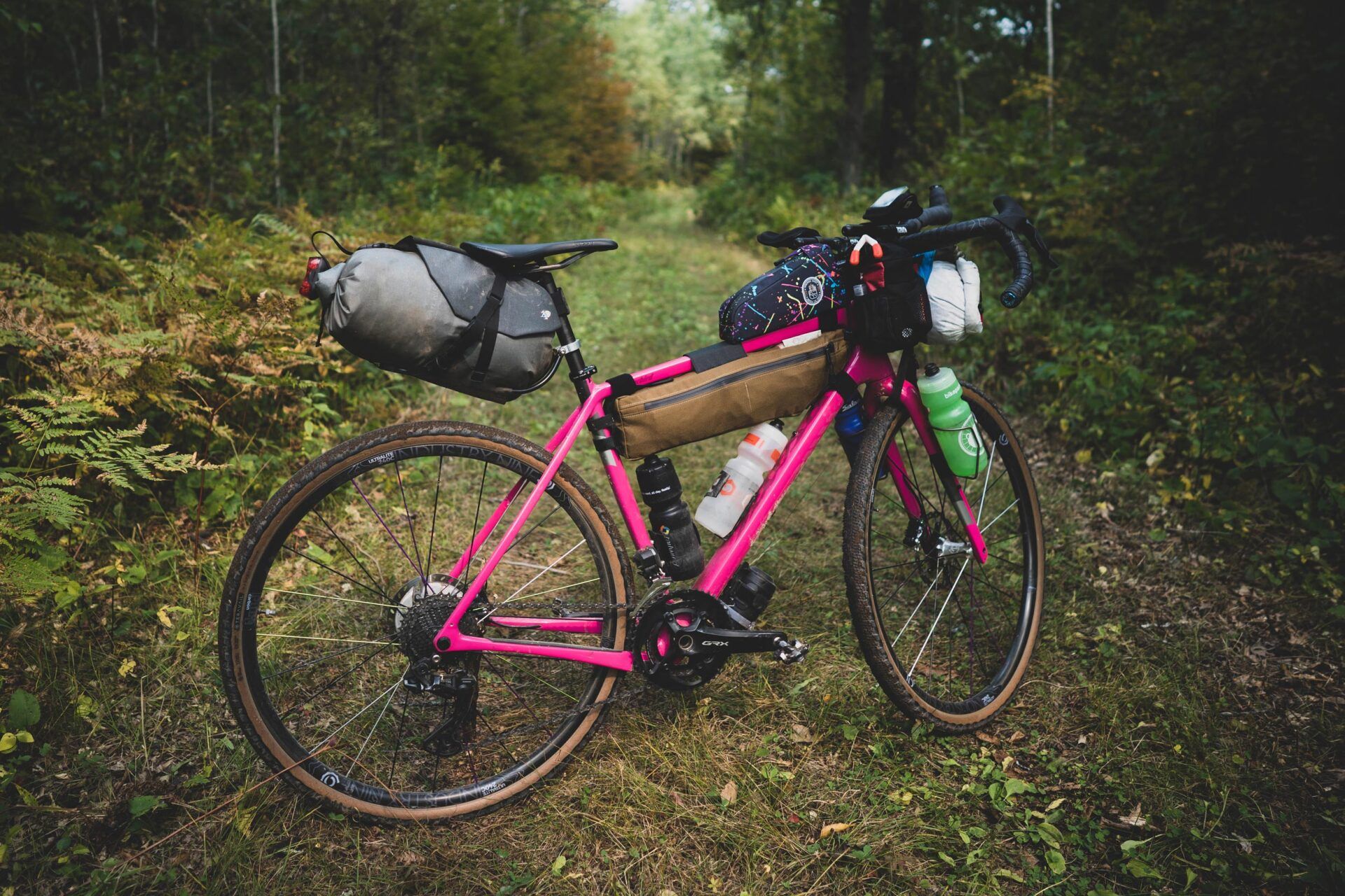 Pink Gravel bike with Bike packing bags