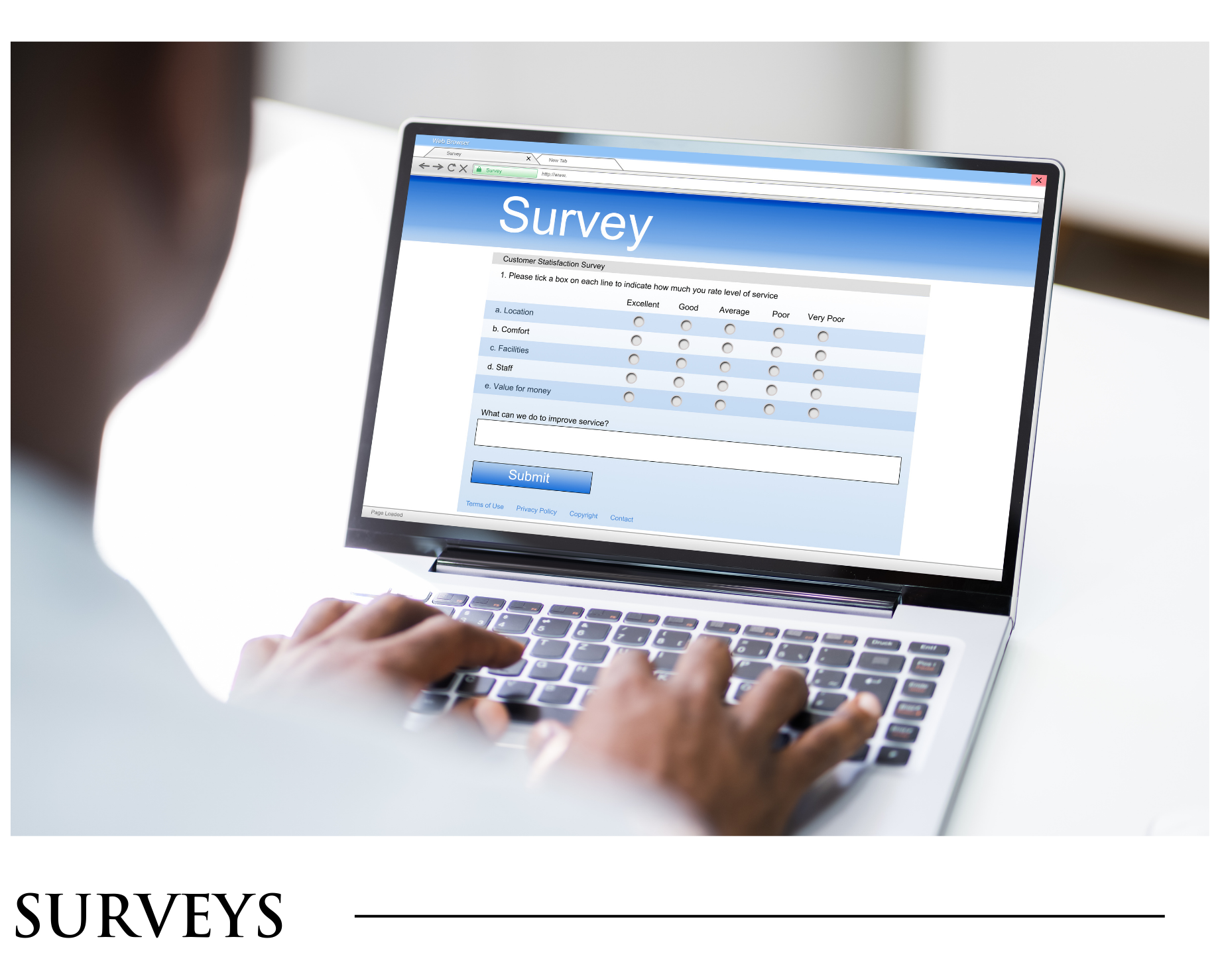 A person is typing on a laptop with a survey on the screen