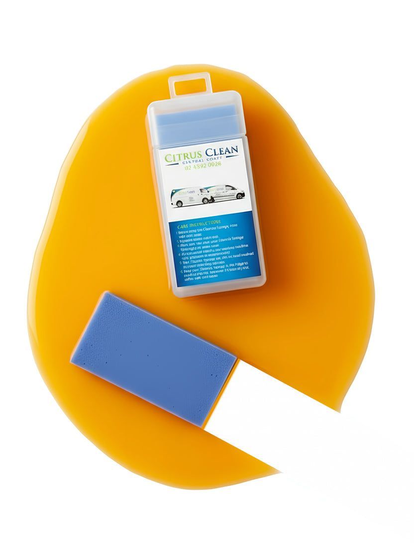 A blue cleaning sponge and a rectangular plastic case labelled — Citrus Clean Central Coast In Lake Haven, NSW