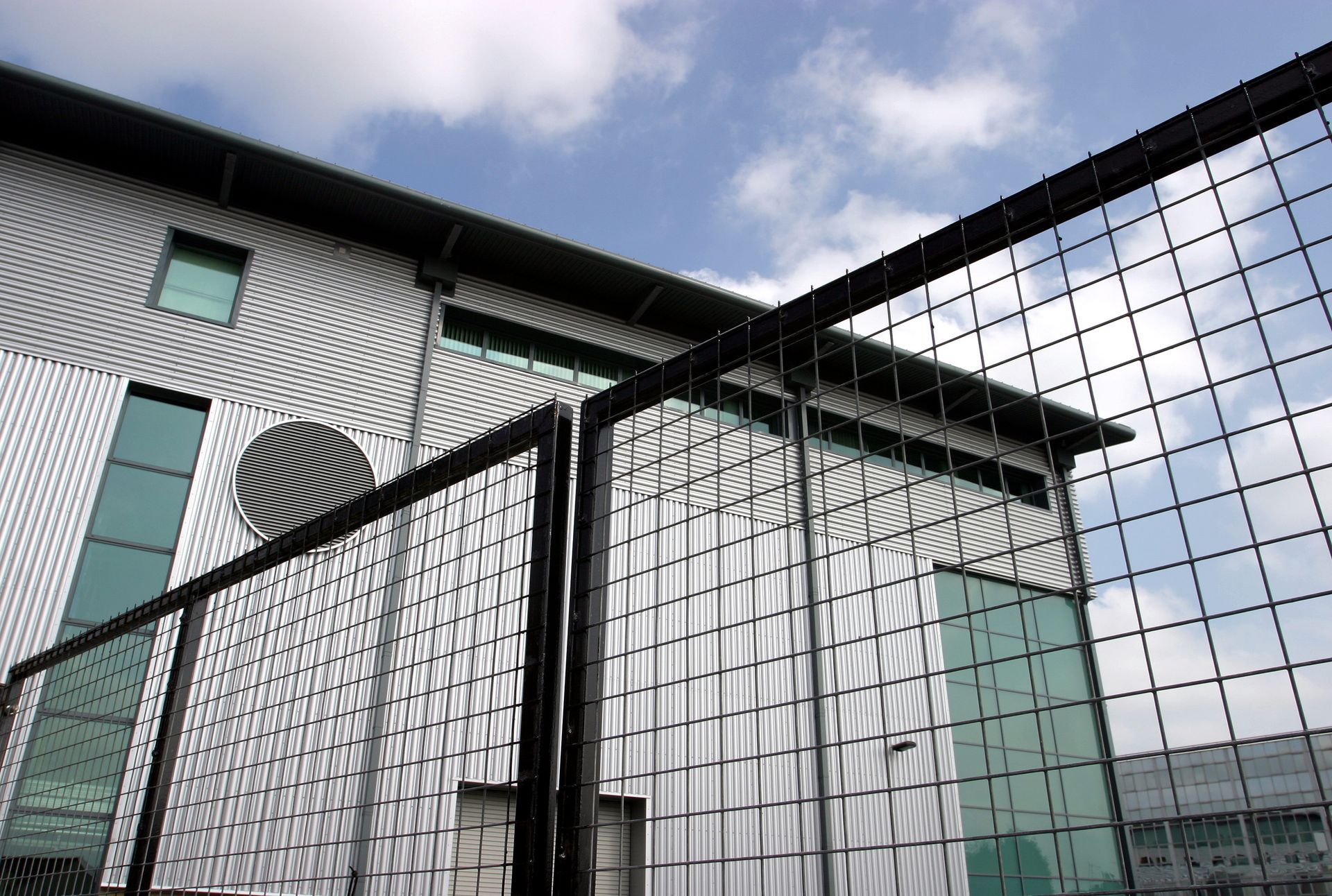 Modern industrial site secured with strong fencing