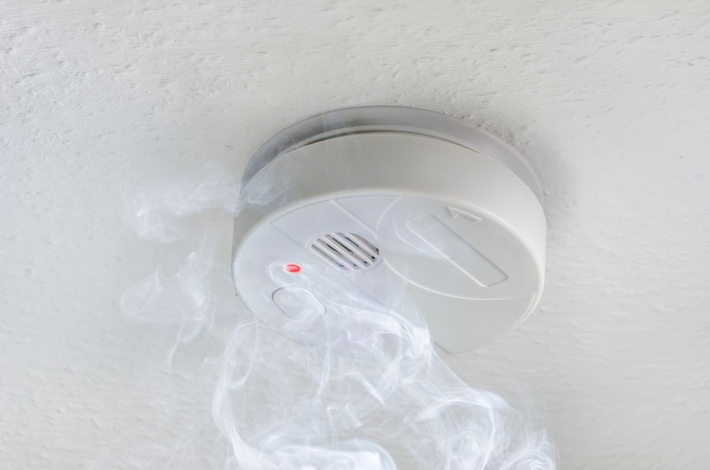 A Smoke Detector is Hanging From the Ceiling — Alert Smoke Alarm Compliance in Maryborough, QLD
