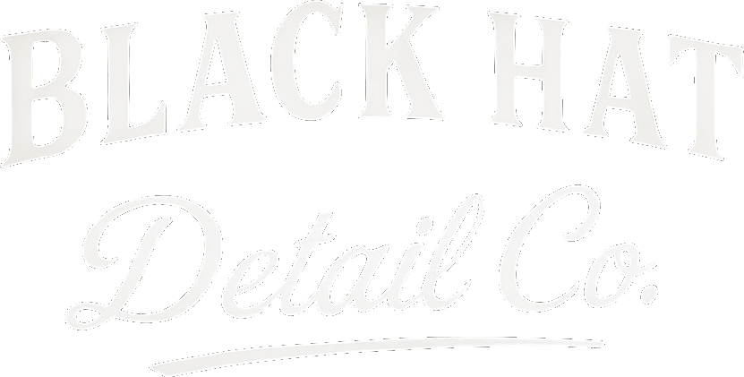 Logo for Black Hat Detail Co. in white, stylized font. "Black Hat" arched above "Detail Co.".