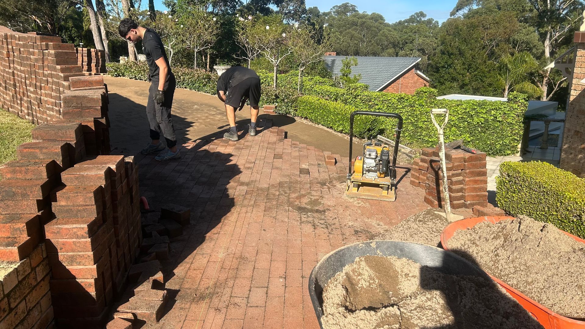 Re lay pavers that have moved over time. We screed and relay paving.