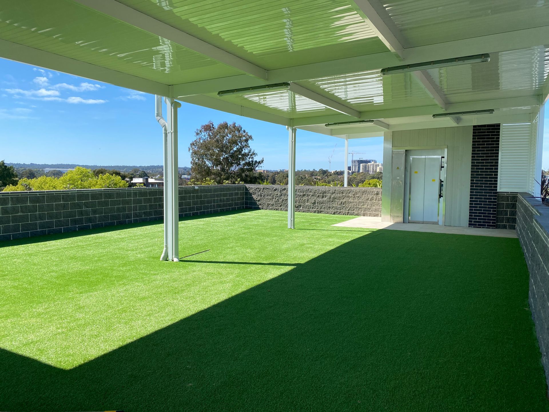 Synthetic grass to roof tops, balconies and communal areas.