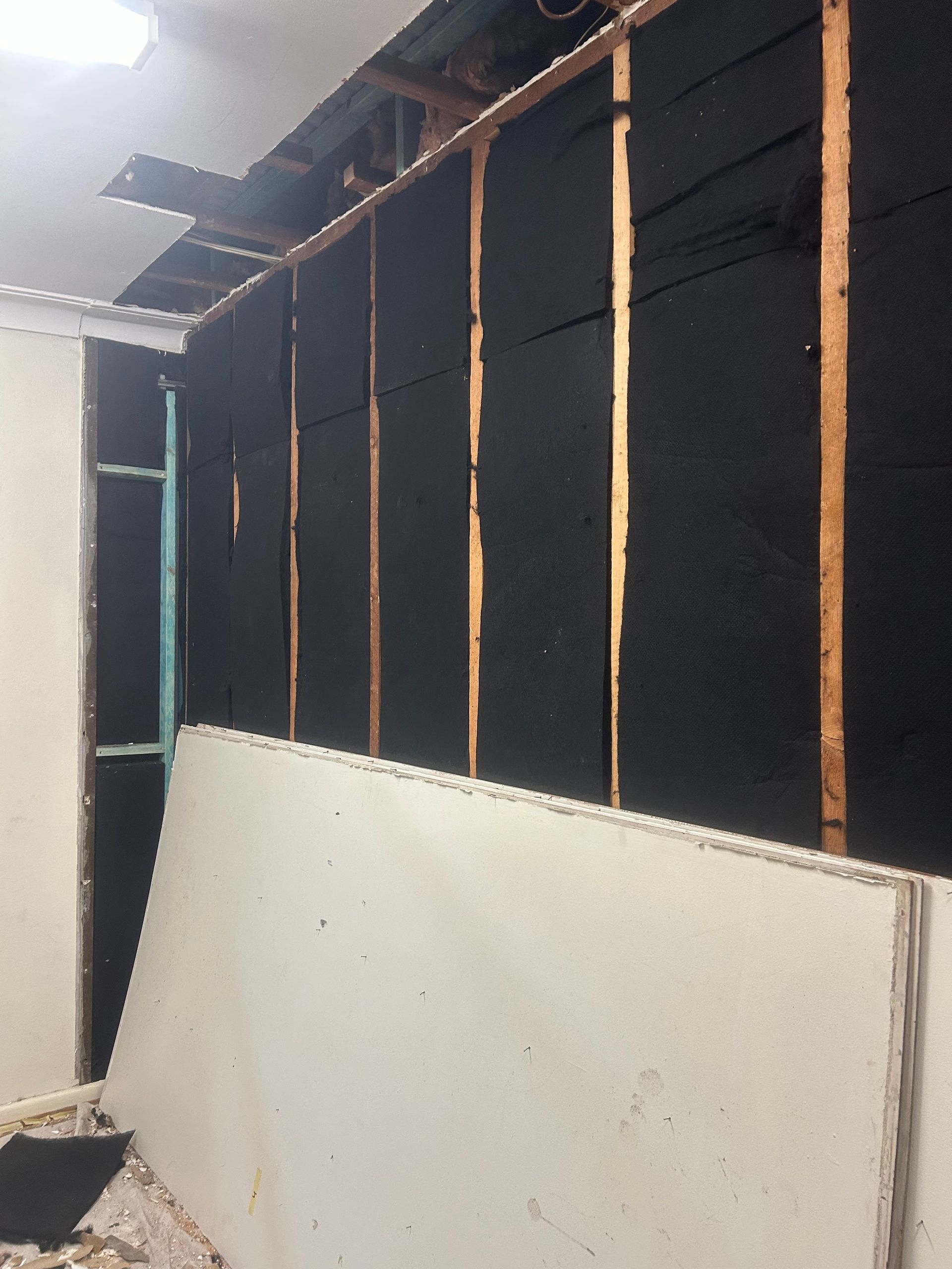 Acoustic insulation between commrcial tenants to reduce noise.