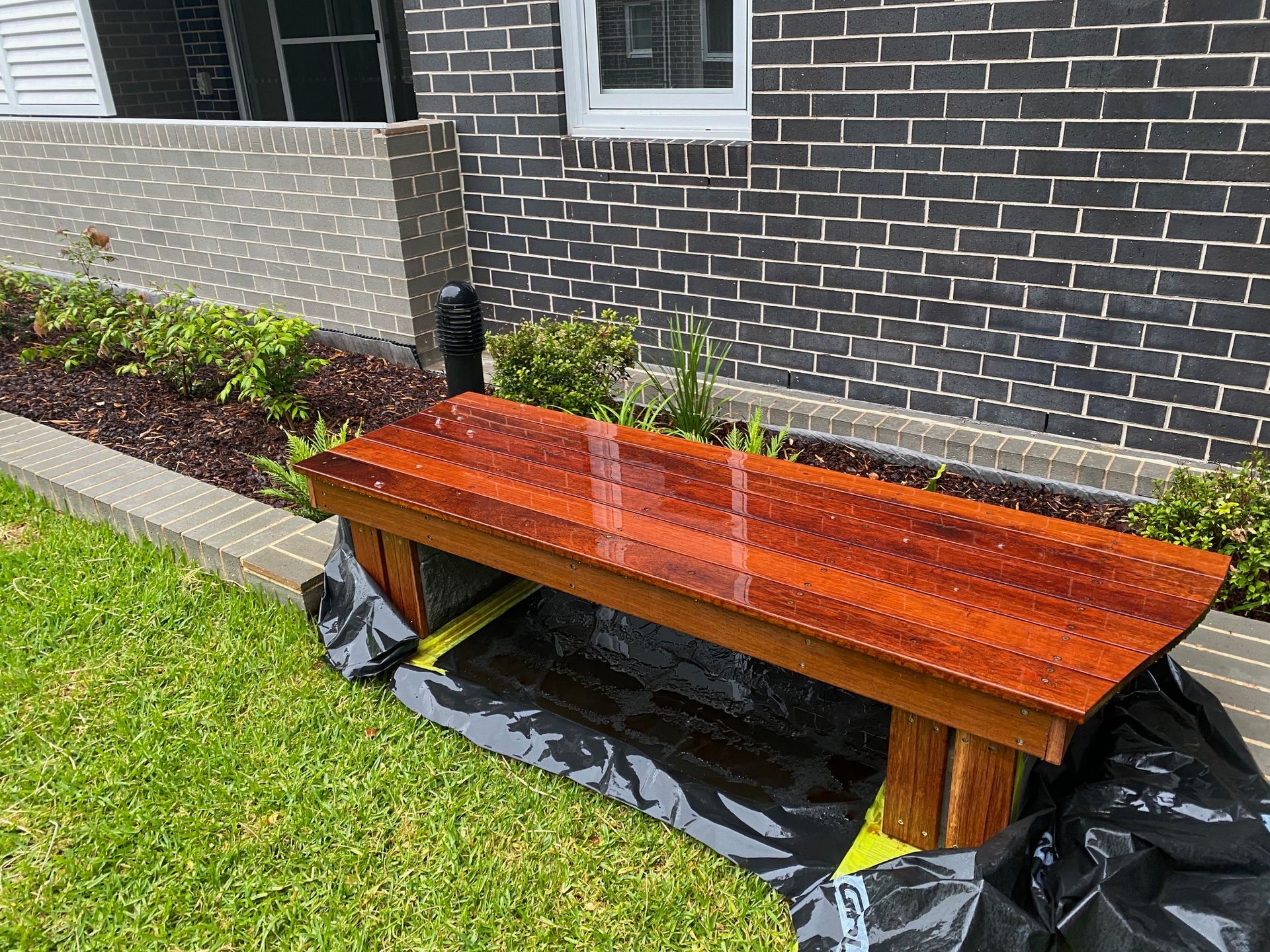 ourdoor garden furniture construction inclusing benches, seats and decking.