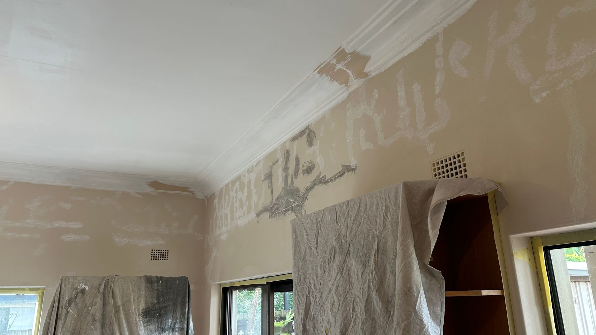 Re paintig of homes including filling cracks in walls and ceilings.
