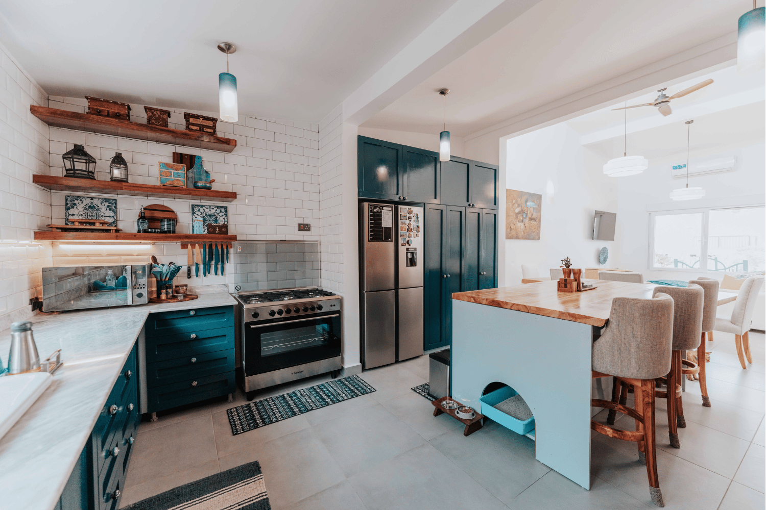 It is a drawing of a kitchen with a table and chairs.